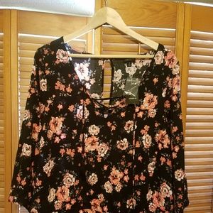 Very cute black and pink romper.